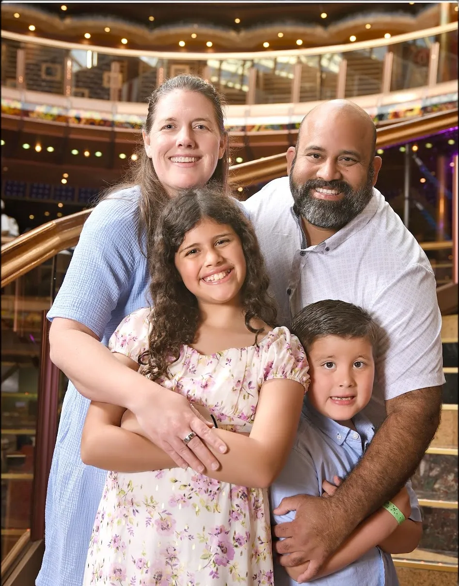 Kate with her husband Omar and their two children on a family cruise